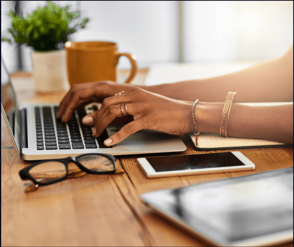 Person typing on a laptop